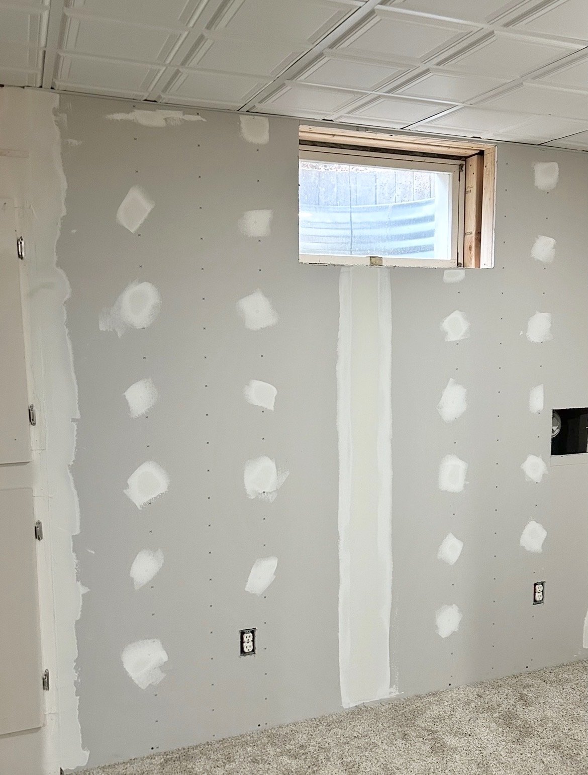 Drywall installation and mudding work in progress at a West Chester PA home repair project by Jacoby Home Improvements