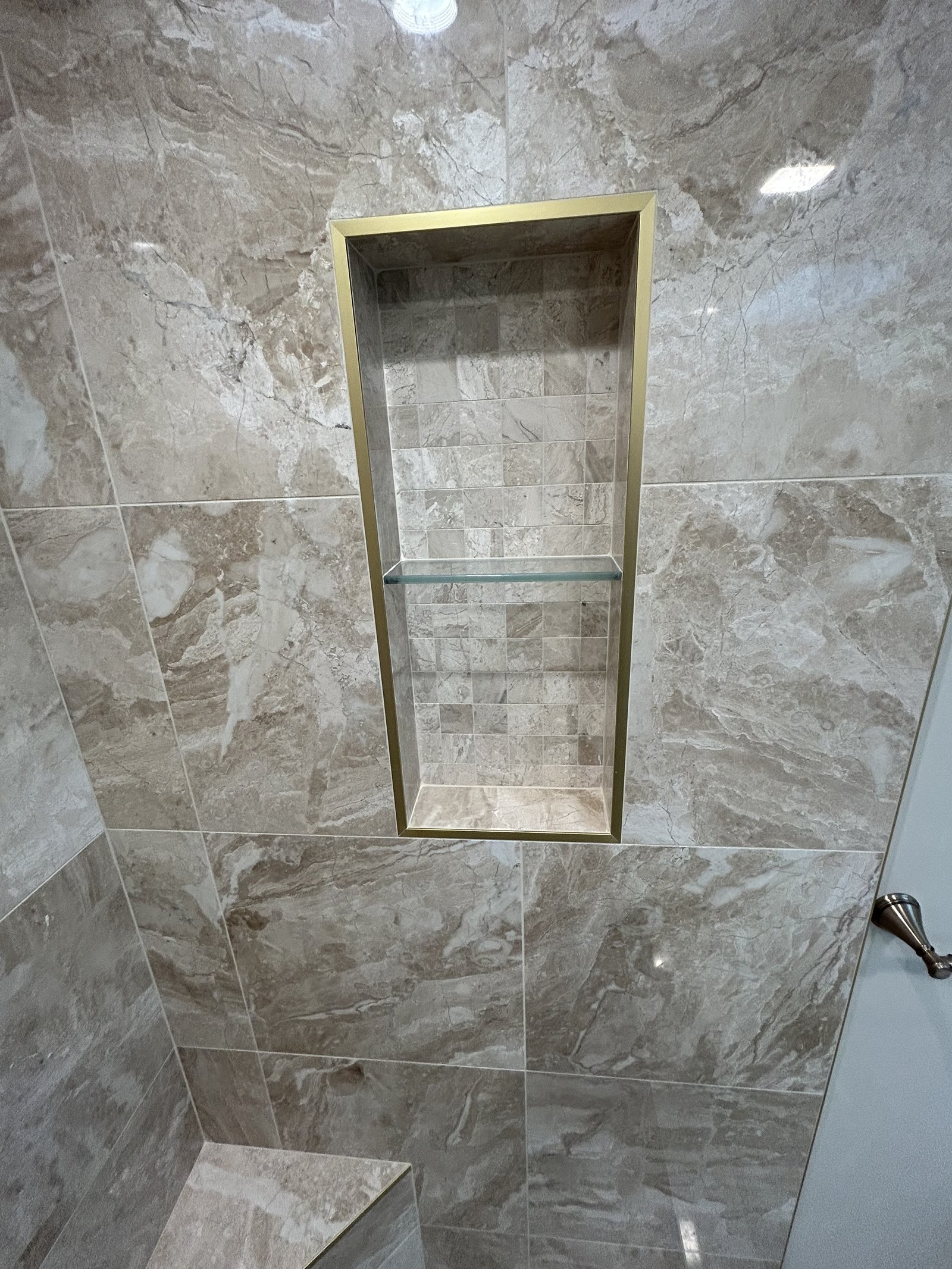 Shower niche with gold trim Chester County