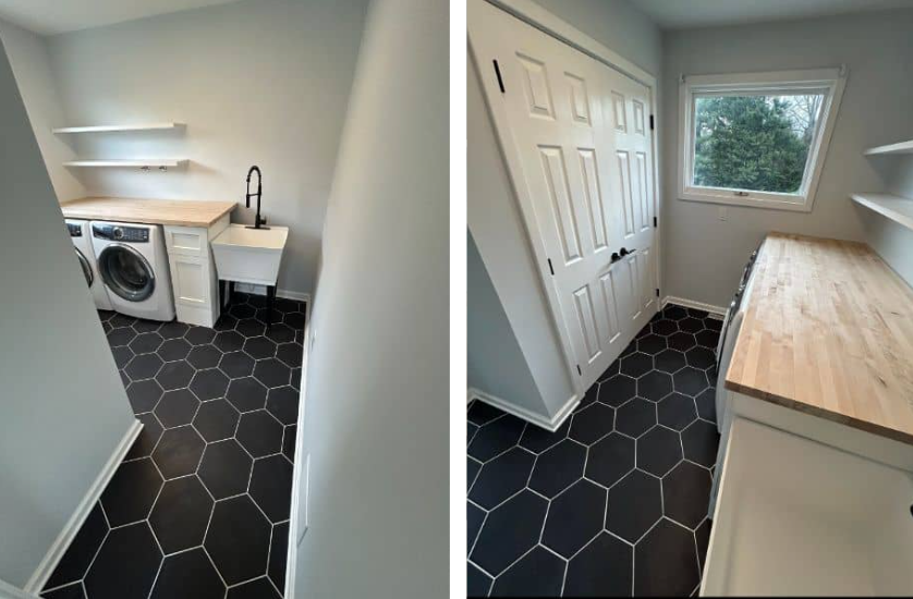 Renovated laundry room with modern cabinets, energy-efficient appliances, and a black hexagon porcelain tile floor